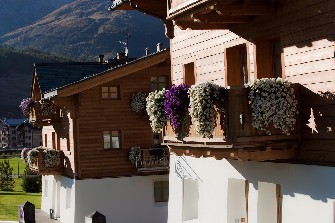Les Fleurs Bleues Aparthotel Livigno Exteriör bild